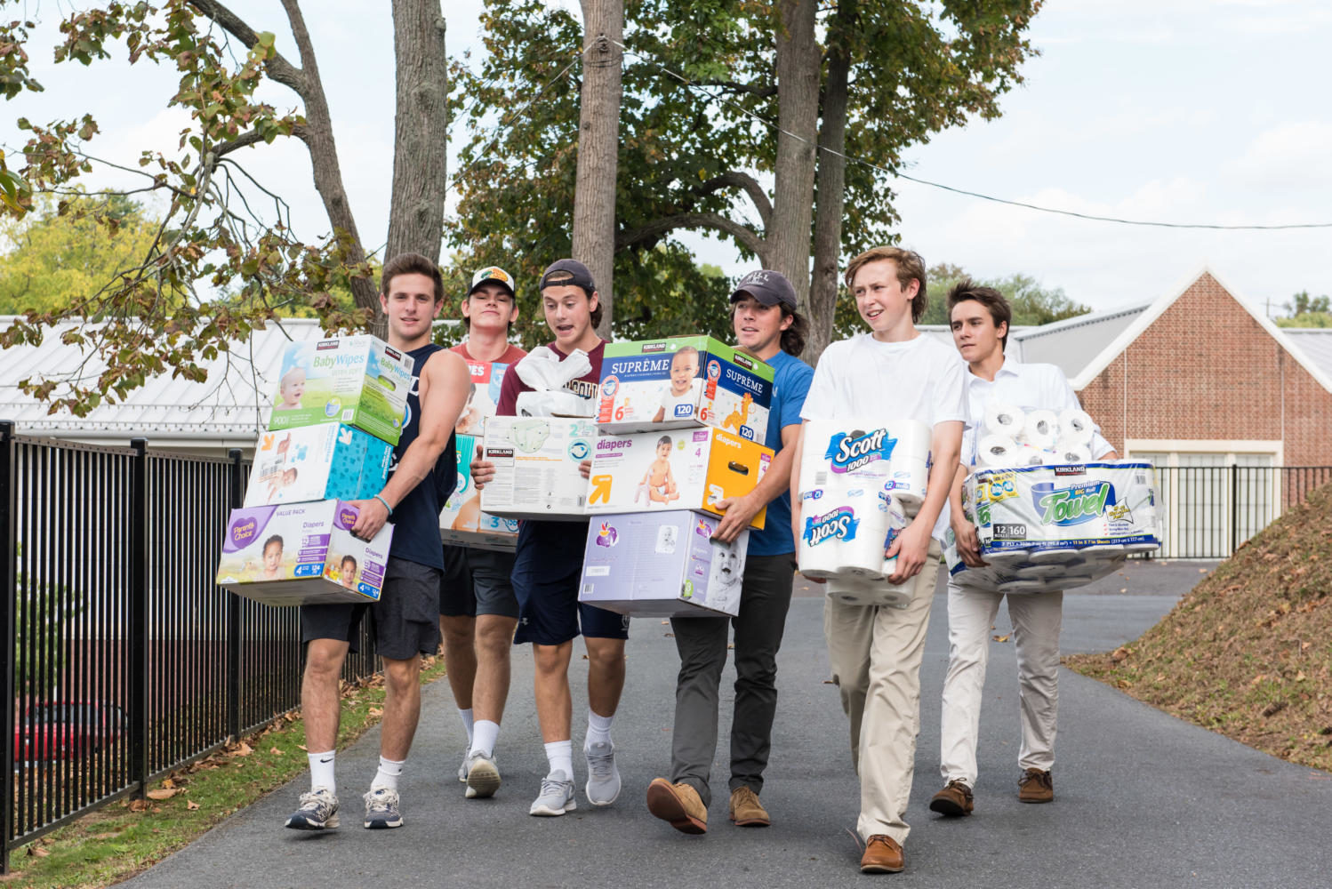 Members of The Hill School community collected donations for the residents of Puerto Rico who are trying to recover from the devastating hurricane Maria.  Members of the hockey team loaded the donations into a bus so the items could be transported to an Allentown warehouse where they were organized for shipping. Photo courtesy of Sandi Yanisko.