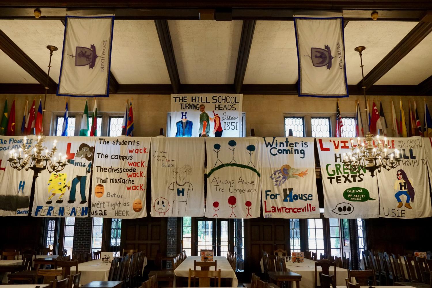 The dorm banners for the 2017 Lawrenceville Weekend are currently hanging in the Dining Hall. Photo by Chloe Garton 18