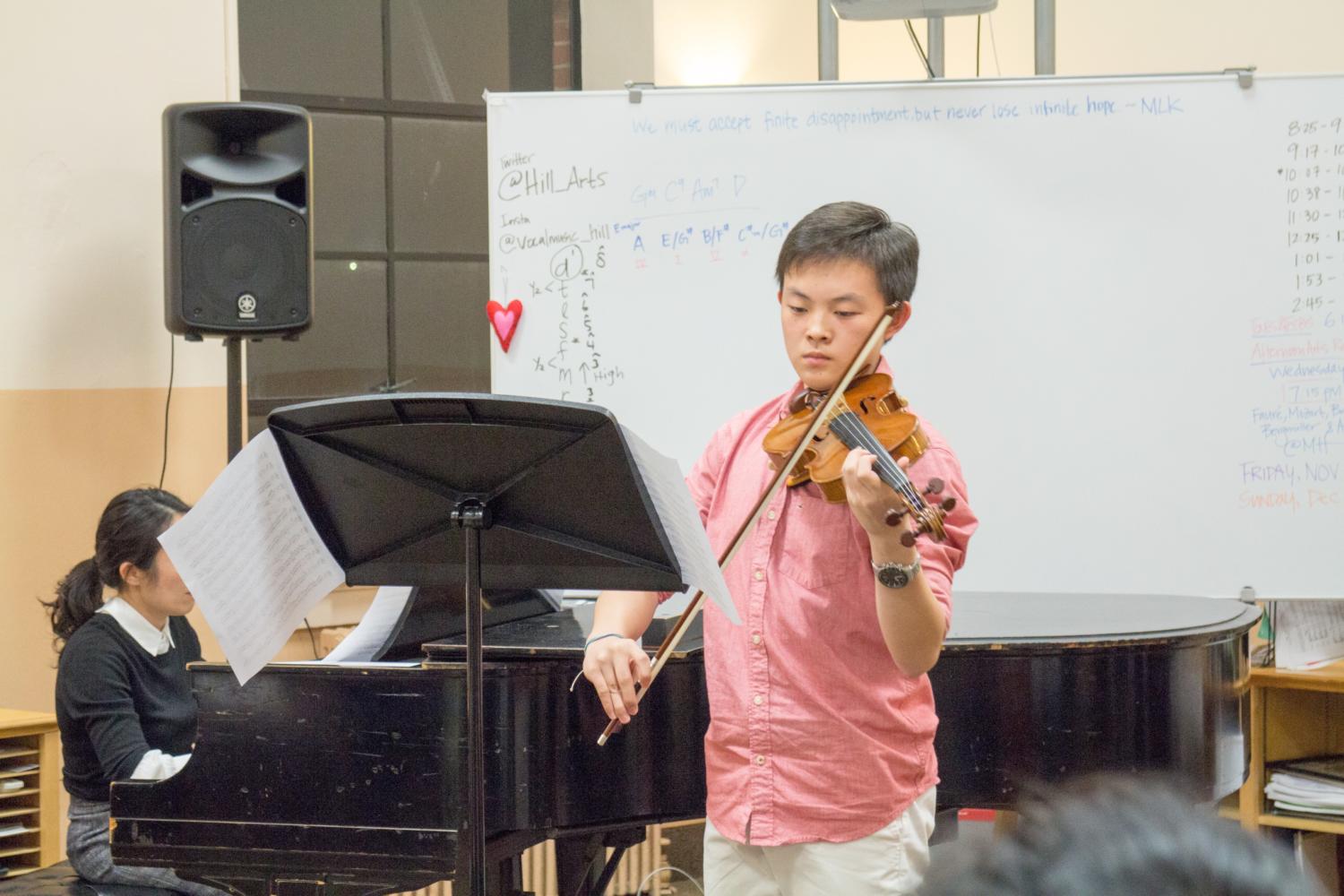 Max Tsiang ’19 playing a piece by Mozart. Photo by Gene Krumenacker 18