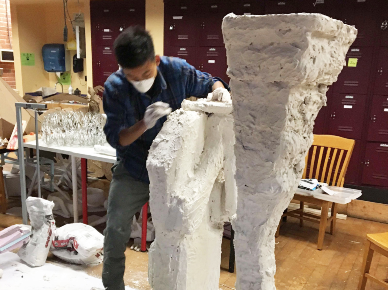 Eric Li ’18 works on a part of his “Spirits” sculpture collection.