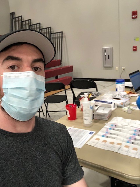 Athletic+Trainer+Chris+McGuigan+receives+his+vaccine.%0A%0APhoto+courtesy+of+Nate%C2%A0+Yinger+and+Stephanie+Schaldonat%2FHill+Athletics+and+Sports+Performance