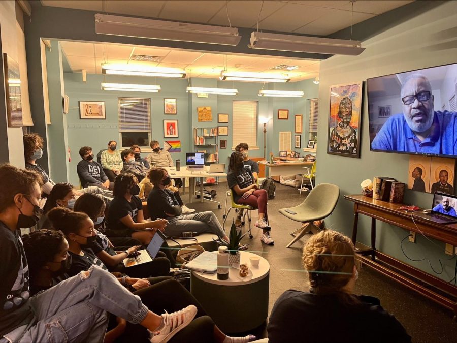 Members of Hills DEI gather in the Warner Center to watch Anthony Ray Hintons livestream on Zoom. Photo by MoniYah Person-Henderson 23.