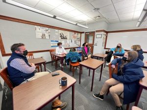 Ed Turner and his advisees share their thoughts and discuss how they felt about the movie Just Mercy. Photo by Erick Sun 24. 
