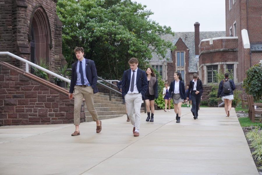 Students travel to their classes during the now universal 7-minute passing period.