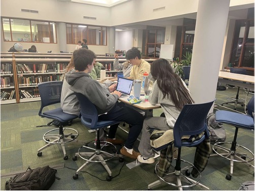 Students gather in the library as they work on their H-term final
projects.