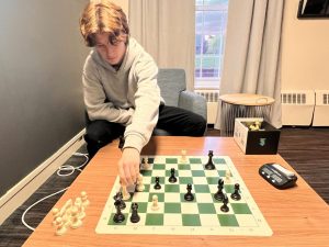 Damien Giannikas '24 plays chess. He was among the top-rated students at Hill.