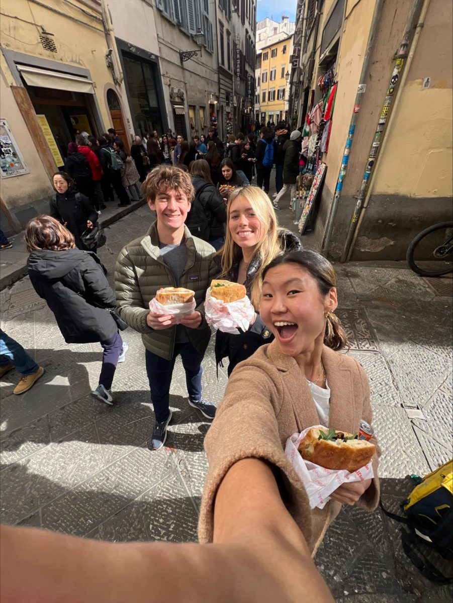Anders Mortenson 24, Lizzy Richter 24 and Ella Lee 24 grab a bite to eat in Rome. 