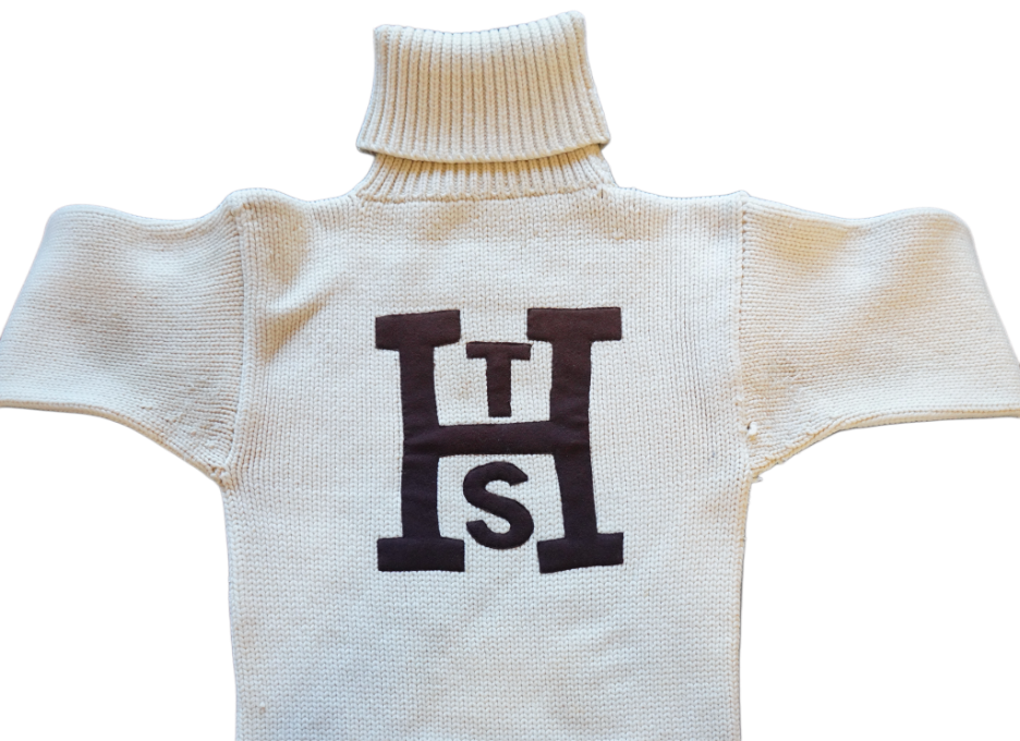 This Major-H sweater is this earlier preserved example of the garment in the school archives. The history of this exact design, which includes both a turtleneck and alternating lettering, remains lost. 