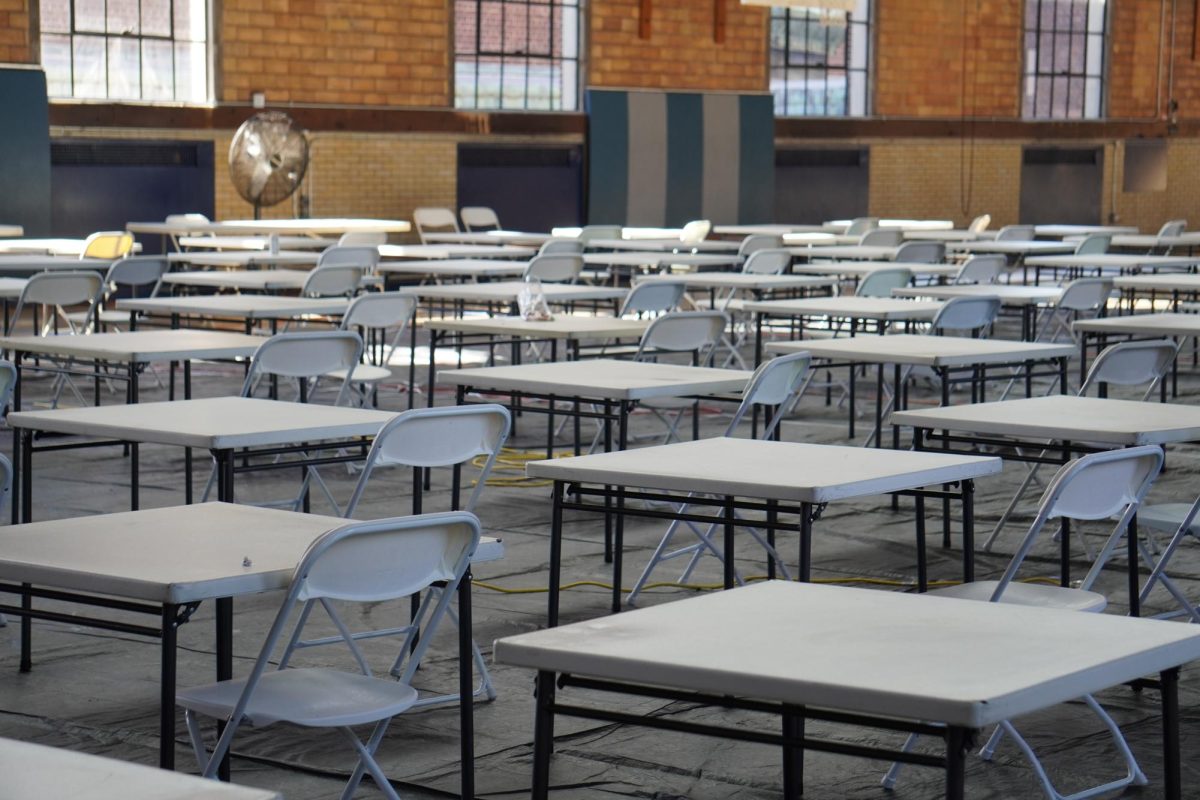 Hill sets out fold-up desks and chairs every year inside Sweeney Gym for AP exams. The school could do even more to support students by better balancing study time with academic success. 